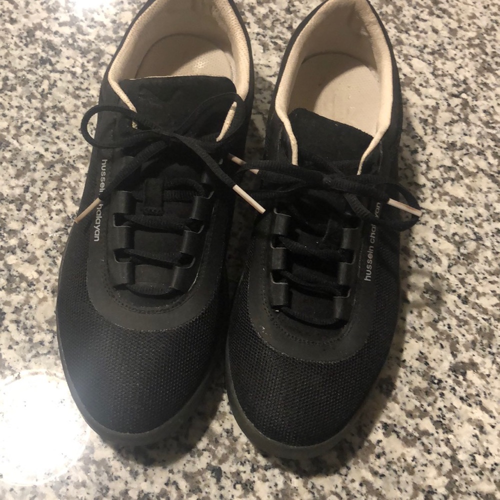 Black Puma sneakers